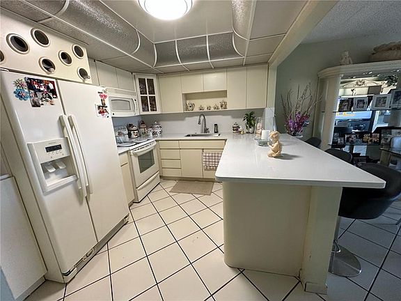 4th image of 6780 W 2nd Court #408