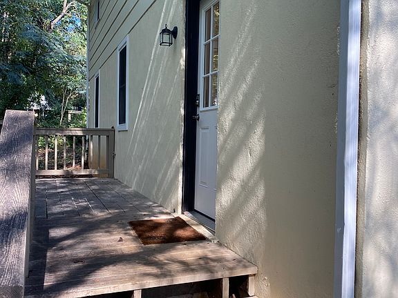 Separate entrance with private deck behind the house