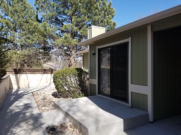 Patio facing open space.