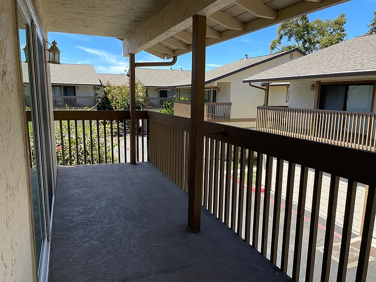 Outdoor balcony, always shaded.