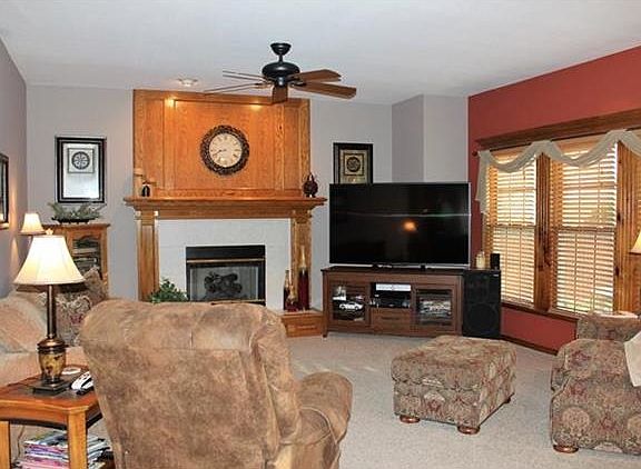 Great Room w/Fireplace & Detailed Trim