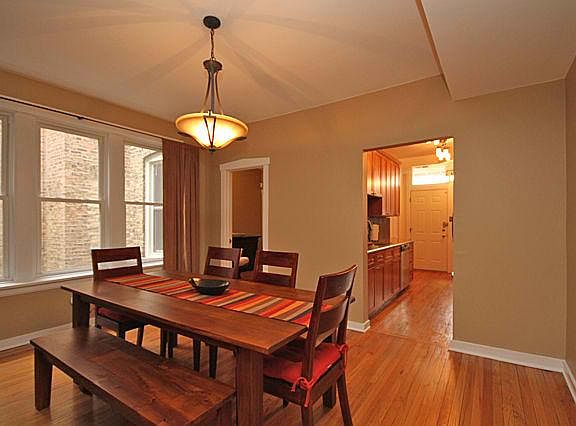 Large dining room with beautiful windows. Perfect for entertaining or create another living space.