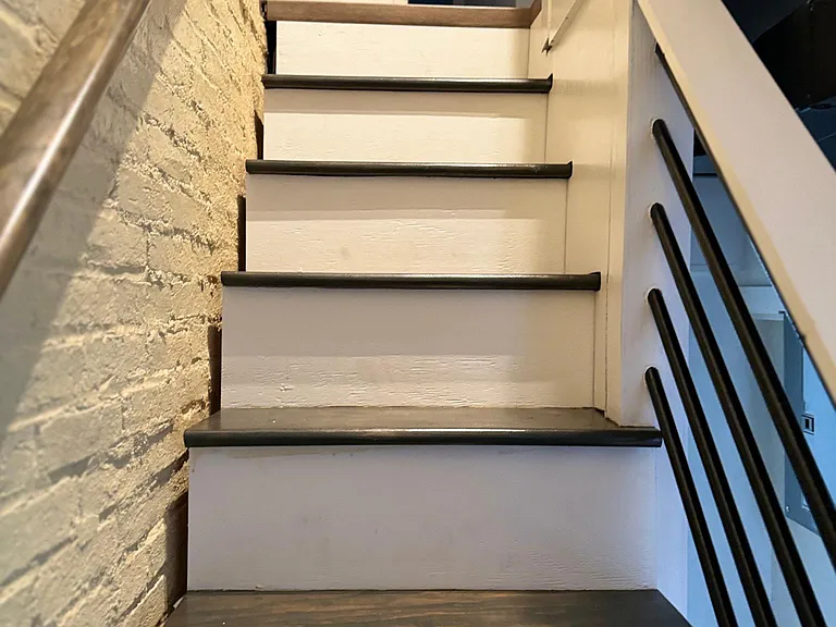 Exposed brick stairwell
