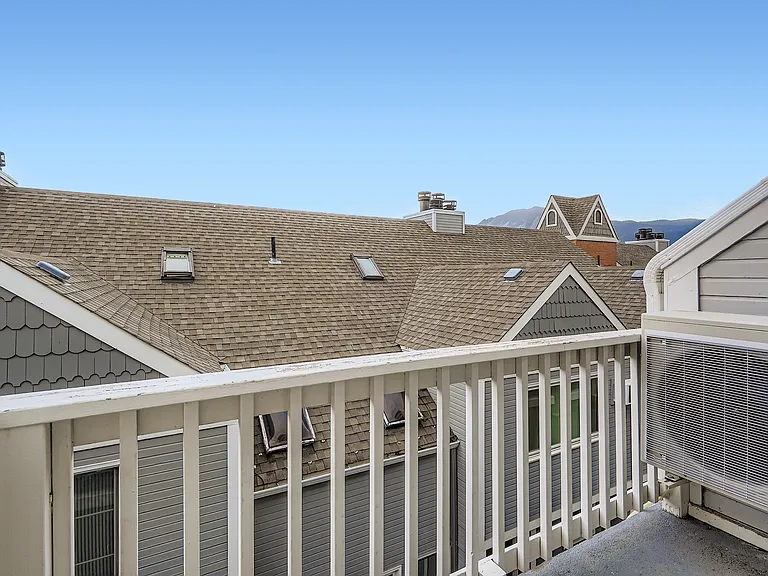 Note that this 3-floor layout provides a bedroom balcony while the others in the building (that begin with 2 and are visible in this photo) only have a window.