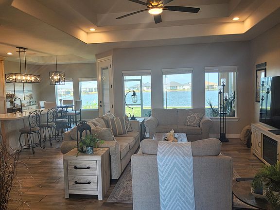 Living room, Fully equipped kitchen, dining room with beautiful lake views