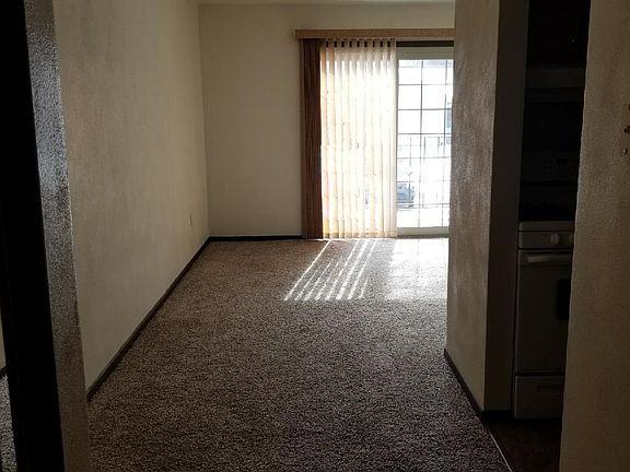 Entry and LR w/ slider to balcony