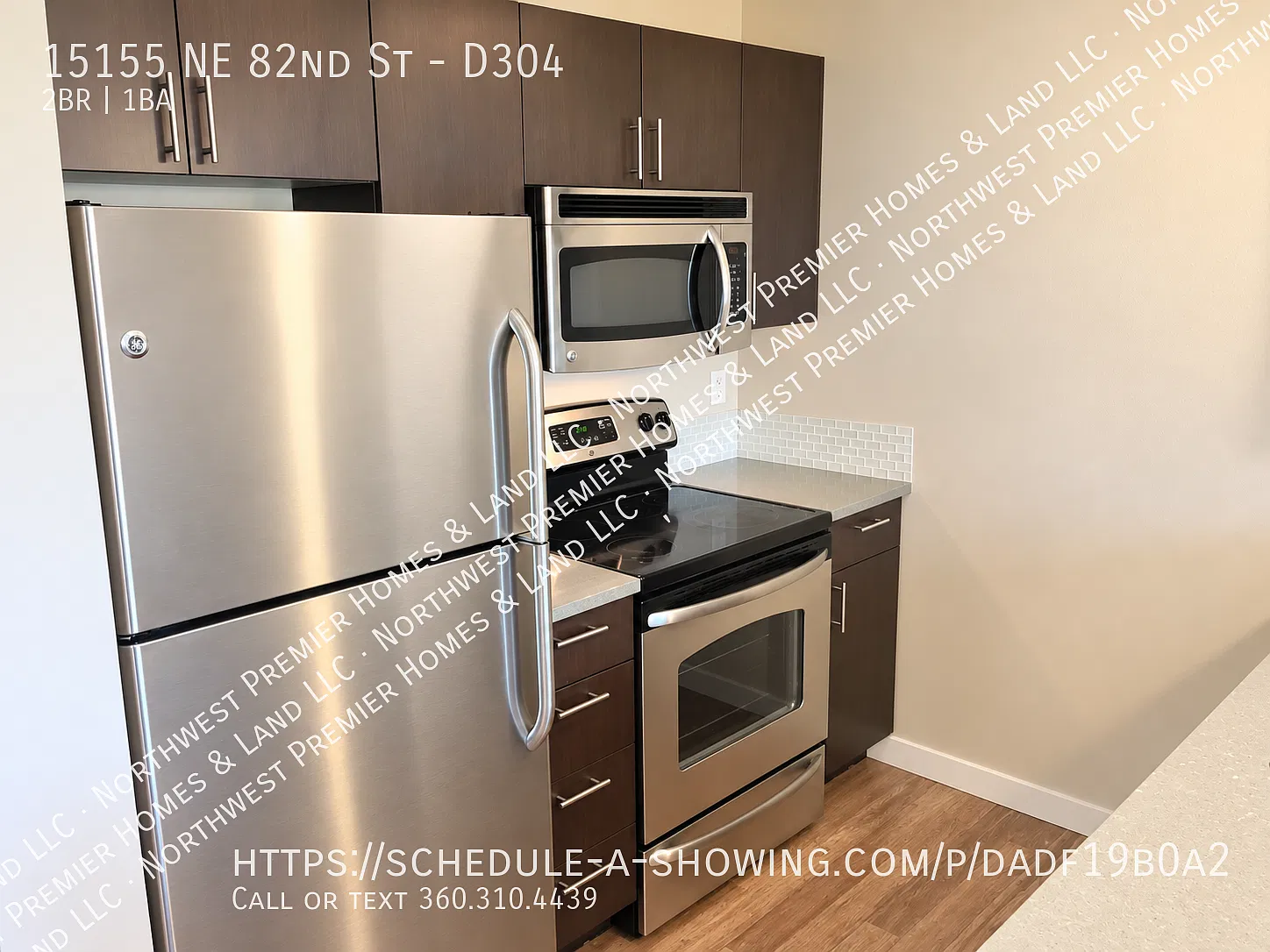 Top-Floor Corner Condo with 2 Parking Spaces & Utilities Included — Photo 3