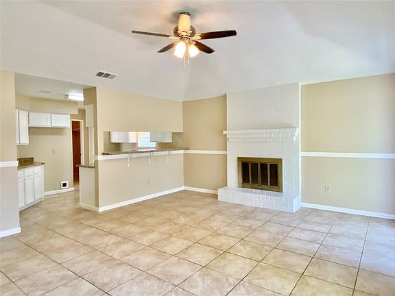 The large living area is open to the kitchen.