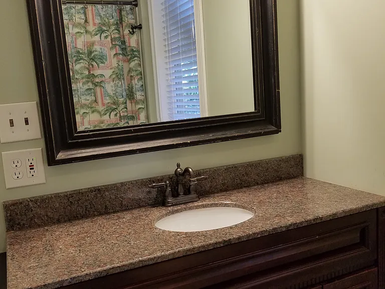 Upscale bathroom fixtures and finishes.