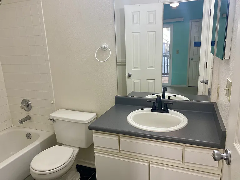 Full bath for kids or guests with separate entrance.