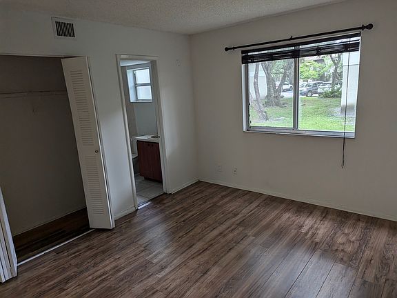 2nd image of 702 Gardens Dr APT 104