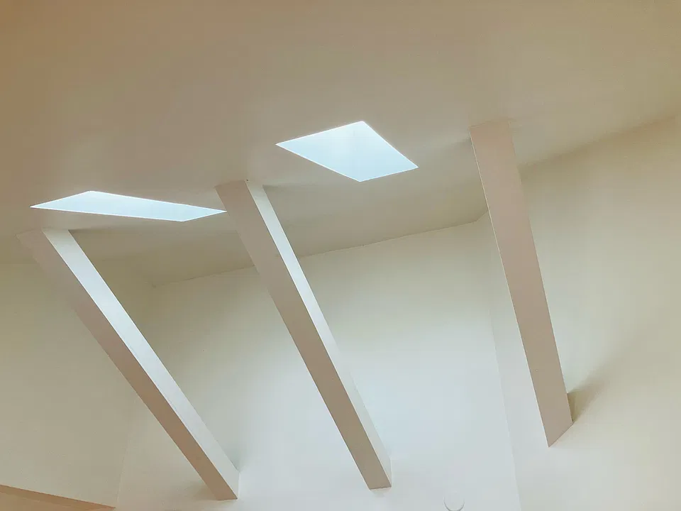 Living Room Cathedral Ceiling and Roof Beams