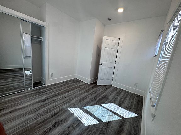 Bedroom 1 with large mirrored closet