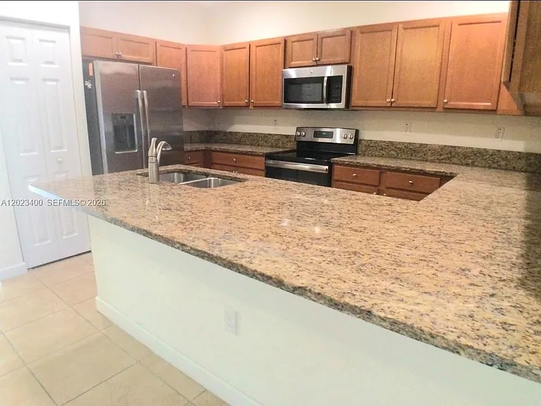 9261 W 33rd Way — Photo 3