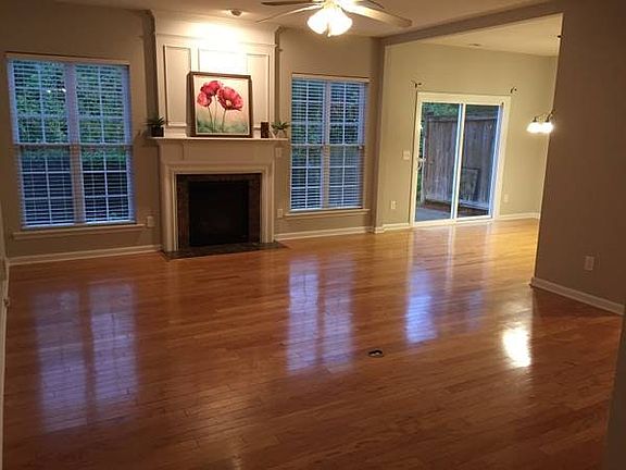Living Room leading to dining and porch access