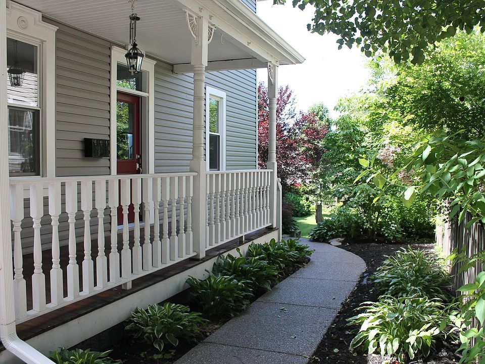 Entrance through shaded porch.