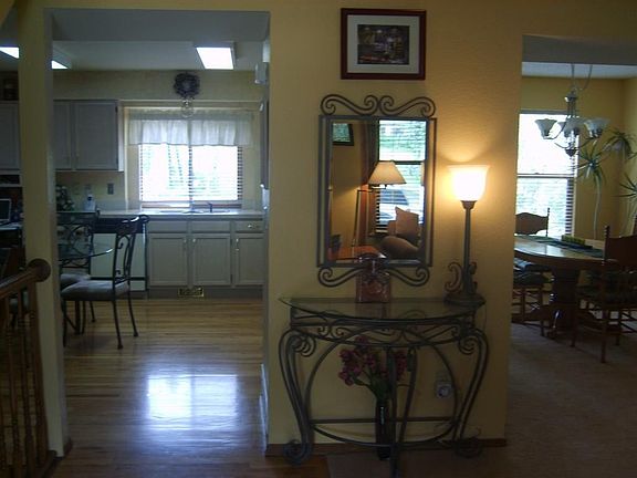 Entry, toward frml dining room and kitchen, lots of hardwood