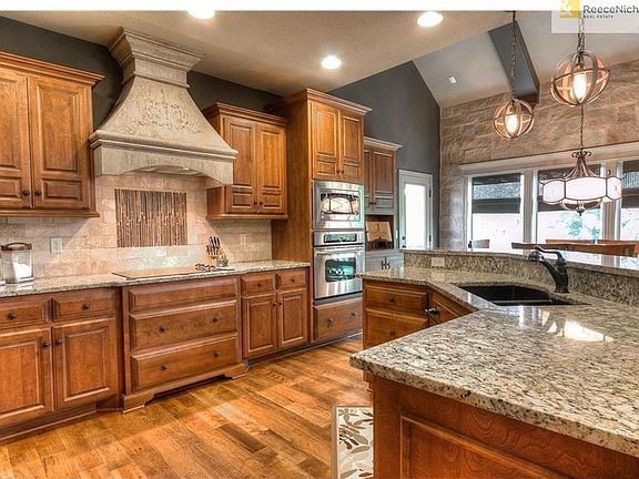 Custom cabinetry and stone accents