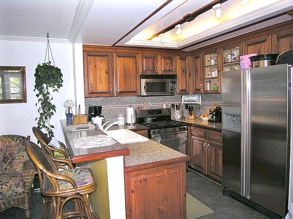Gourmet Kitchen W/Granite Counters & Breakfast Bar  & Stainless Appliances