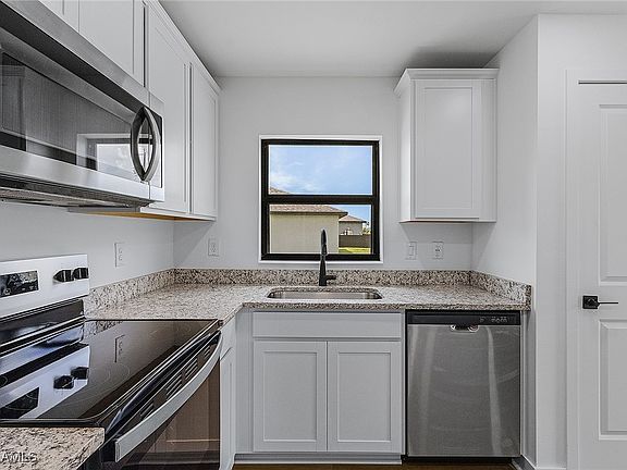 4th image of 210 NW 29th Ter