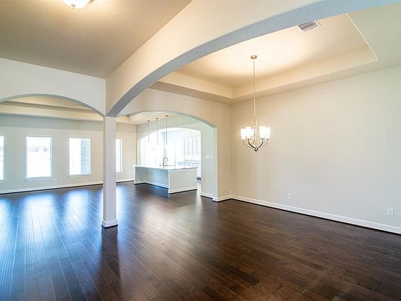 To the right is your Formal Dining Room with plenty of room for a large table.