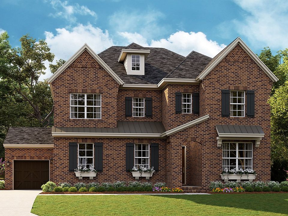 Coronado - English Cottage 3-Car Side Load Garage Note Renderings may show optional features