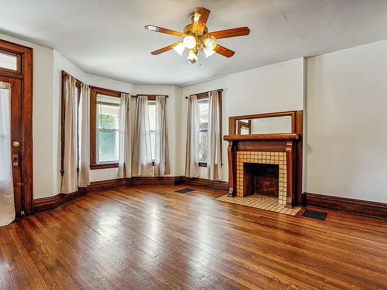 Front living room walks out onto large front porch