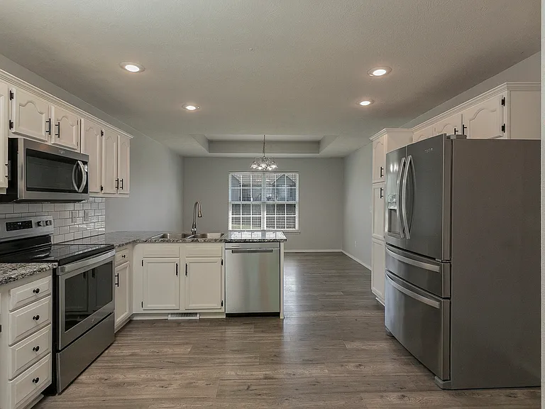 granite countertops; white cabinets