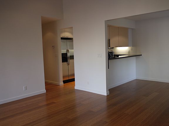 Living Room, Dining Room, and Kitchen from corner