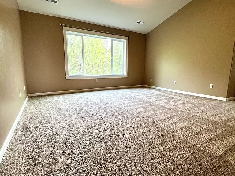Large Master bedroom with vaulted ceiling