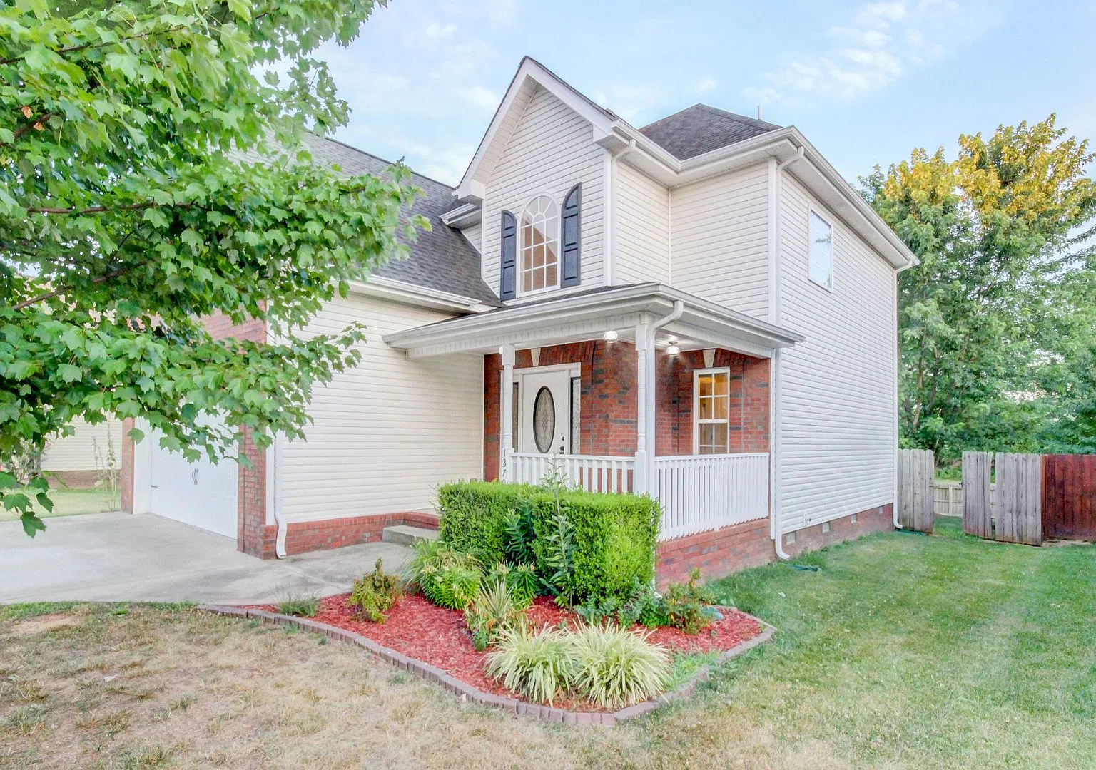 Stunning Brick Front Home With Fireplace And Hardwood Flooring In Fields of Northmeade — Photo 1