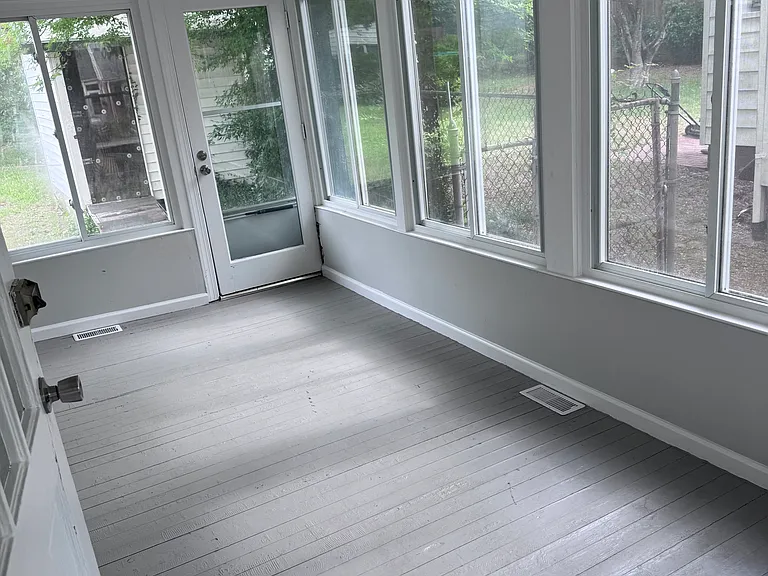 The air controlled sun room is a bonus room that can be used for multiple purposes.