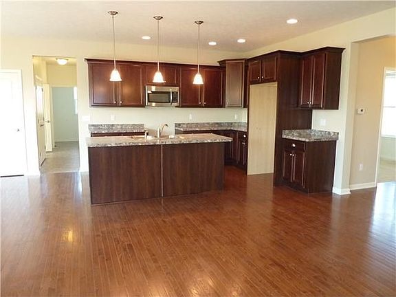 Beautiful Maple kitchen with stainless appliances.