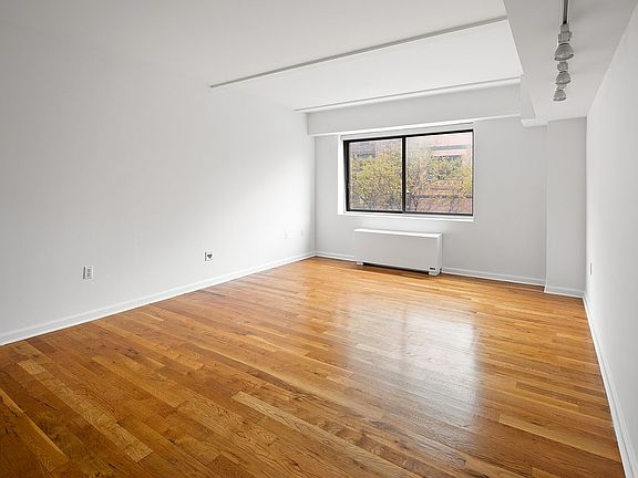 2nd image of 240 E 10th St APT 3D
