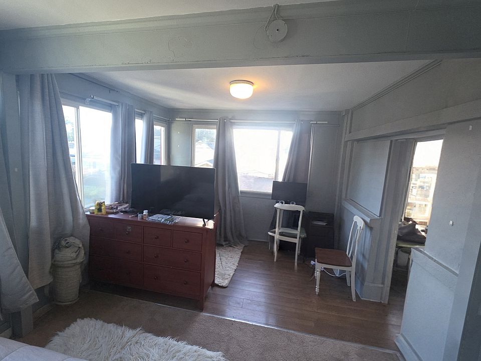 This is the master bedroom with me additional office space / whatever you want space. I Apologize I use the object remover to make the image look as clutter free as impossible.