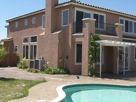 Rear of home and pool - new photos to be loaded by 9-15