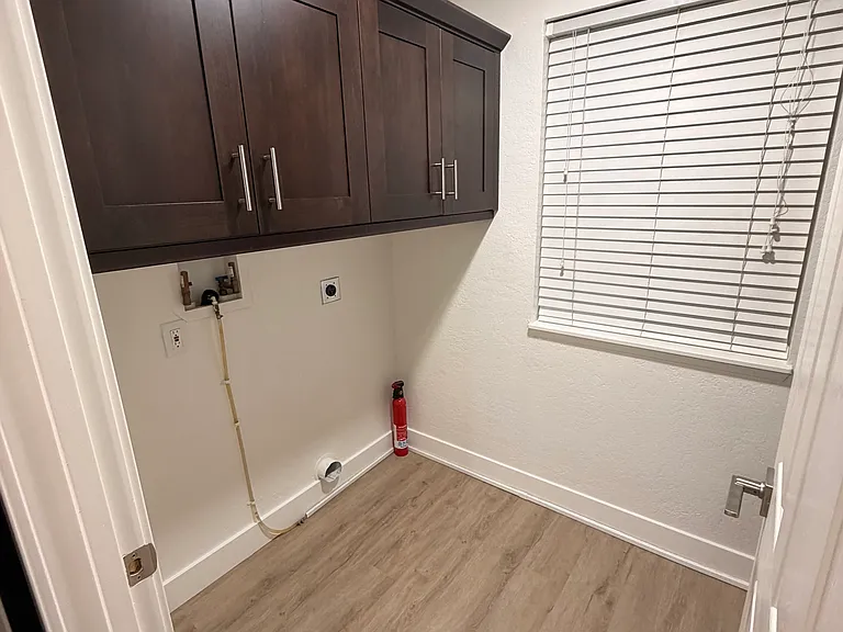 Laundry room with washer/dryer hookups. Washer and dryer is available for $75/month