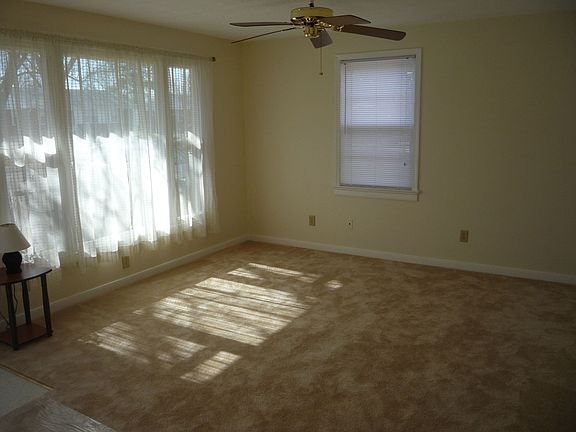 New carpet and paint with hardwoods underneath
