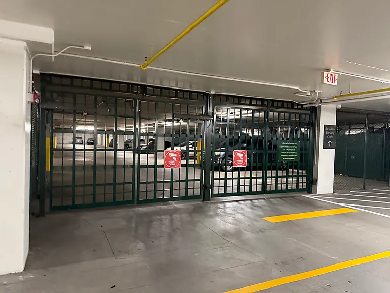 Gate to building parking, assigned spaces