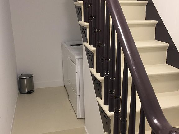 Entrance Vestibule with Stairway to 2nd Floor Apt. and Shared W/D