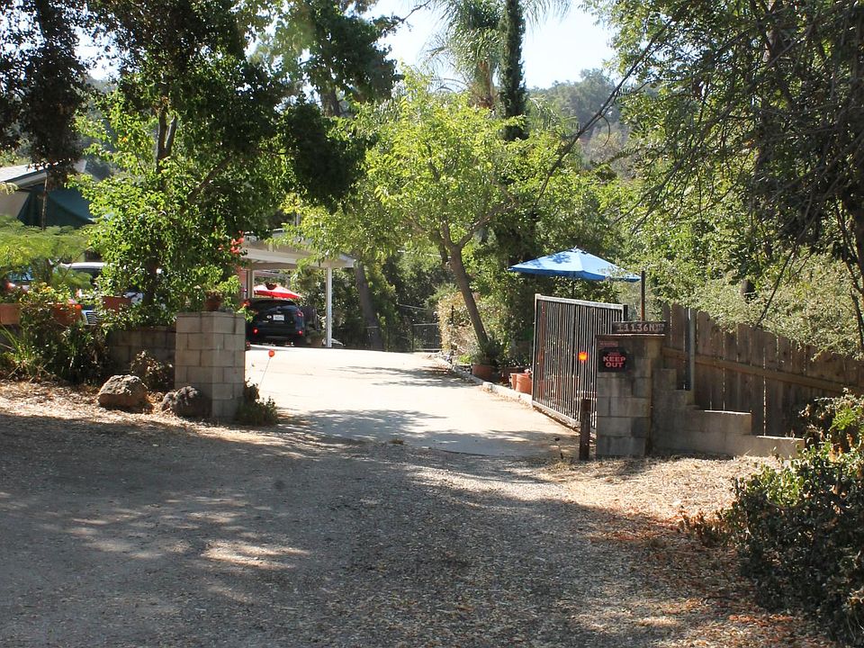 Tranquility at the end of a private lane. The Guest House is to the right of the main house.