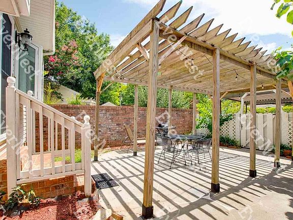 Lanai and fence to carport