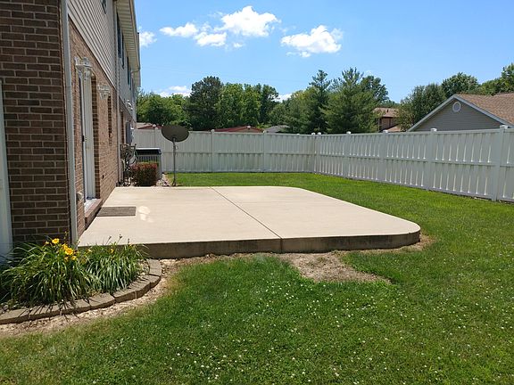 Perfect back patio with privacy fence for BBQ