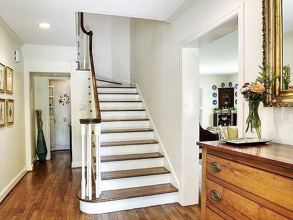 Elegant formal entry. Hardwoods throughout. The house has exceptional storage for this vintage of a 