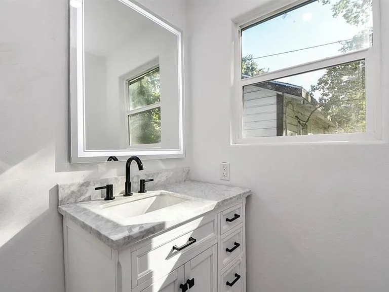 6834 Saint Augustine St — Photo 11