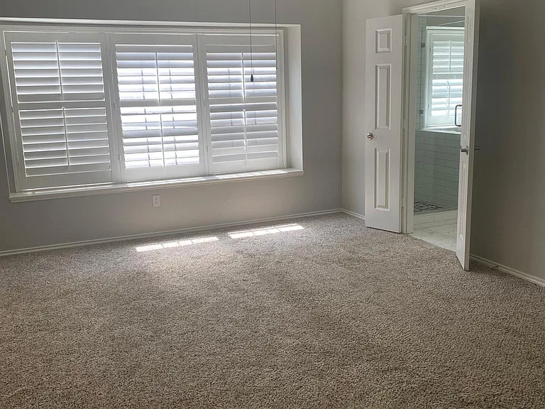 Master bedroom with 2 walk-in closets.