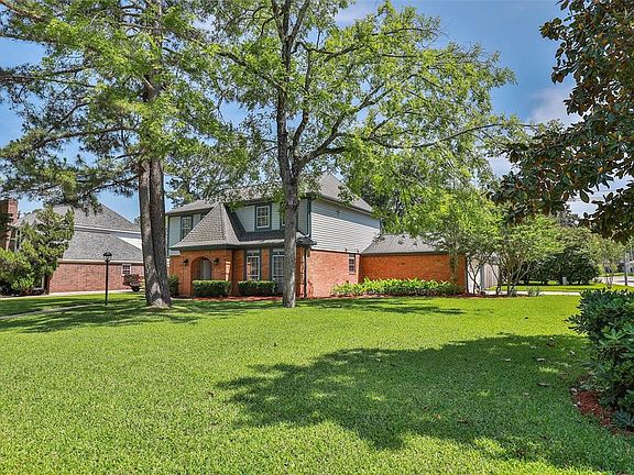 This prestigious corner lot is a showstopper! From front to back this home is adorned with a lush landscape. Roof & gutters 2015.