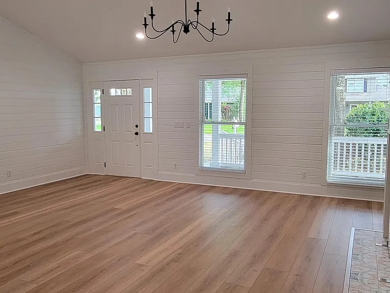 Open Concept Main Room, New Luxury Vinyl Wide Plank Floors Throughout the Home, Ship Lap Walls