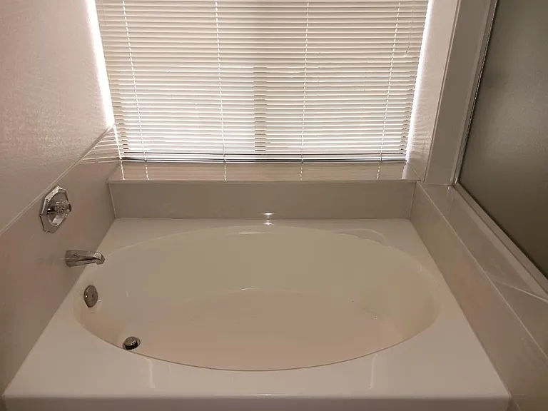 Jacuzzi tub in master bathroom.