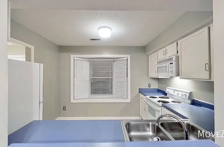 4233 Baylor St — Photo 13
